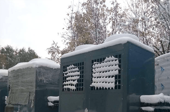 snow buildup on the heat pump outdoor units